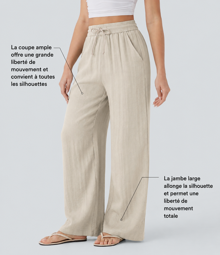 Pantalon décontracté taille haute, poches et cordon de serrage, jambes larges, aspect lin.
