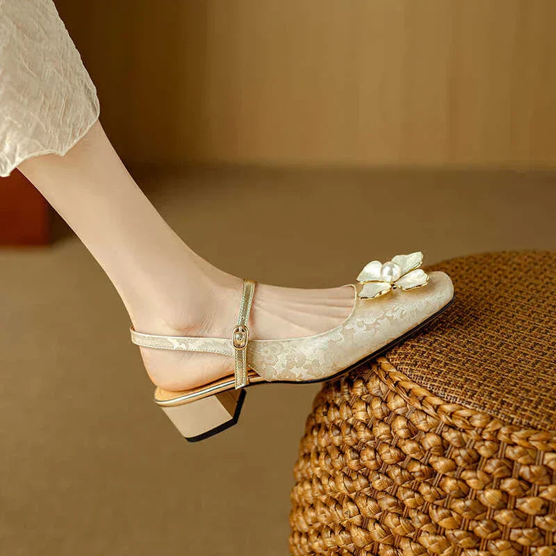 Slingback Pumps by Genine
