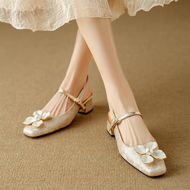 Slingback Pumps by Genine